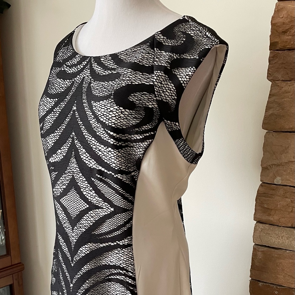 White mid high dress with front and back black lace